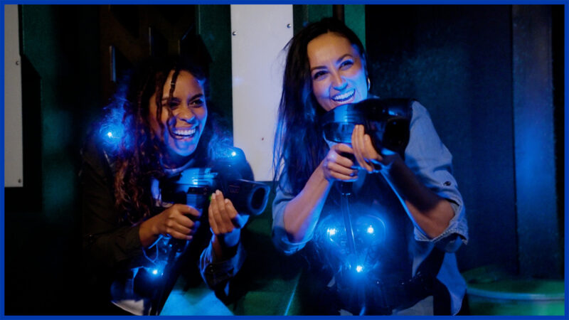 Players inside the Delta Strike laser tag arena